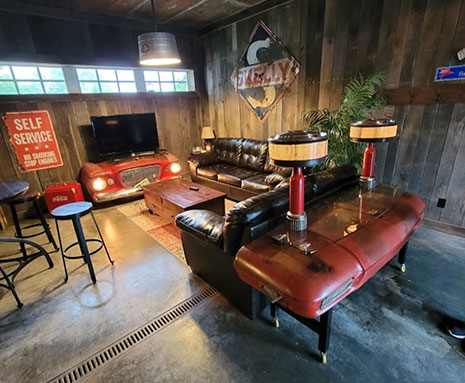 The Home Place at Valley View a Kansas City Missouri Wedding Venue includes a Groom's Room with a pool table, sofa and love seat and Flat Screen TV.